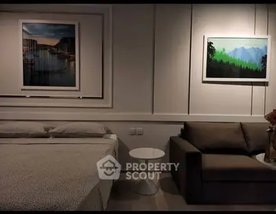 Modern bedroom with stylish decor and cozy seating area