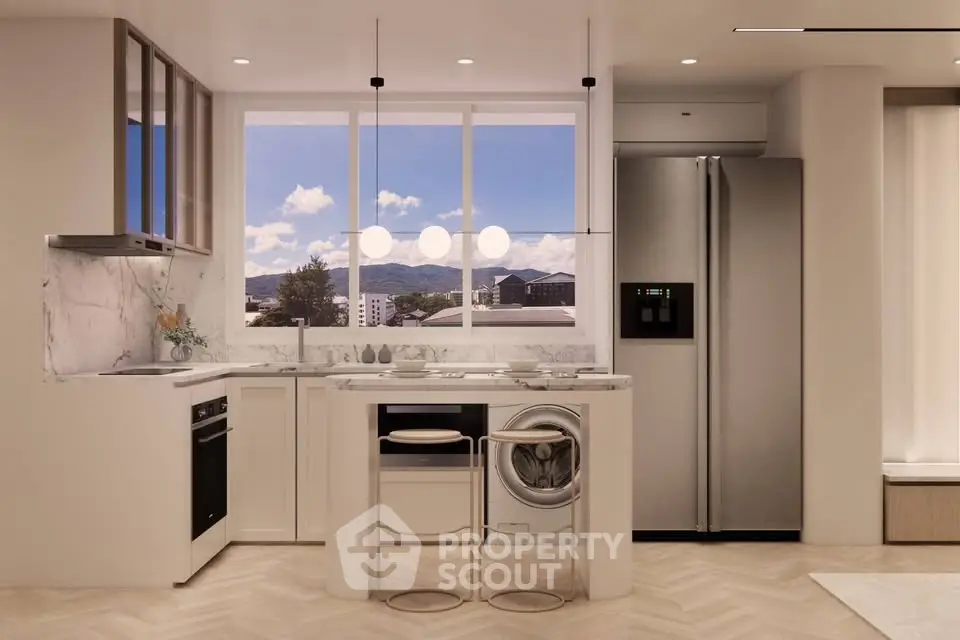 Modern kitchen with sleek appliances and mountain view