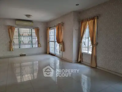 Spacious empty living room with elegant curtains and tiled floor
