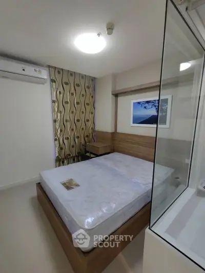 Modern bedroom with stylish decor and natural light