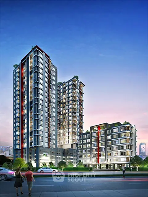 Modern high-rise residential building with stunning architectural design and urban skyline backdrop.