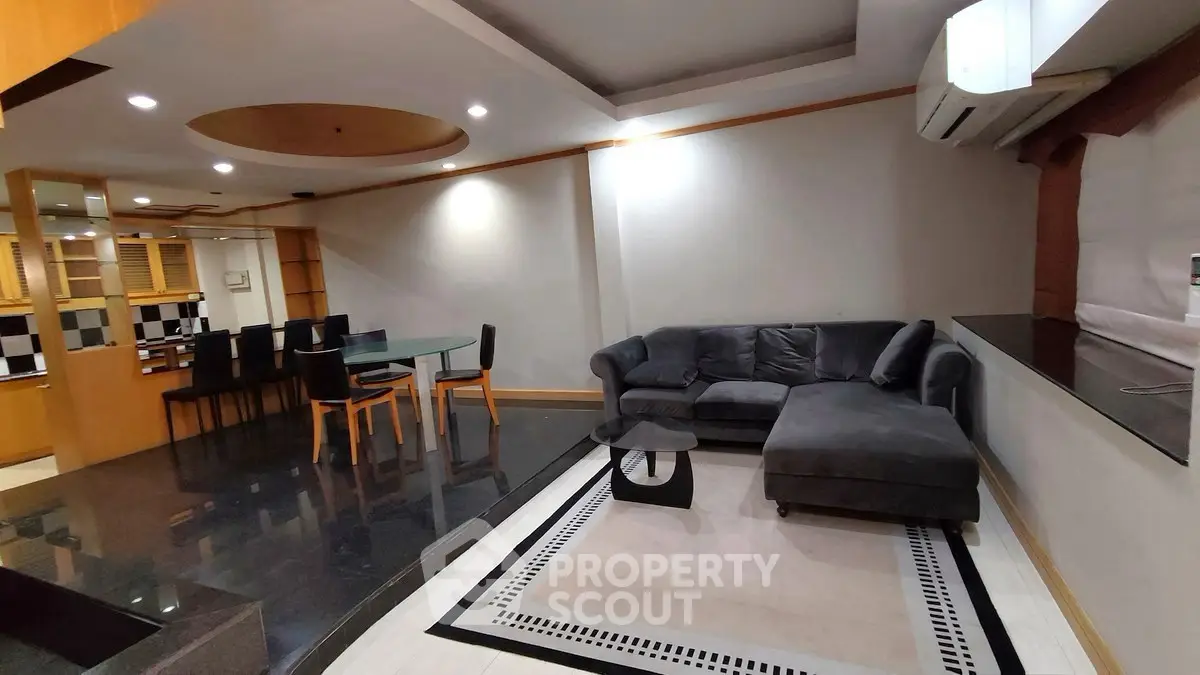 Spacious modern living room with stylish furniture and open layout