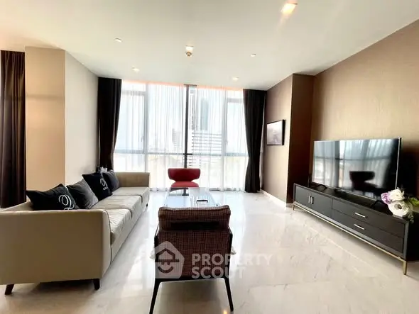 Spacious modern living room with large windows and elegant decor