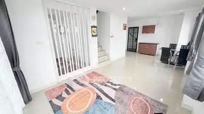 Spacious modern living room with stylish decor and dining area