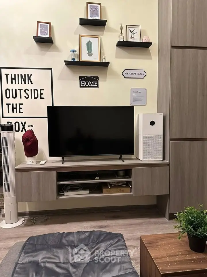 Modern living room with stylish decor and entertainment center