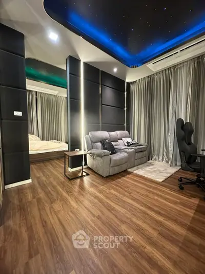 Luxurious modern living room with starry ceiling and sleek furnishings