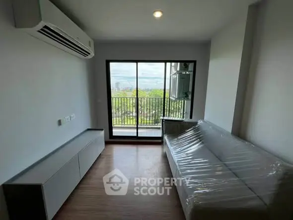Modern living room with balcony view in a stylish apartment