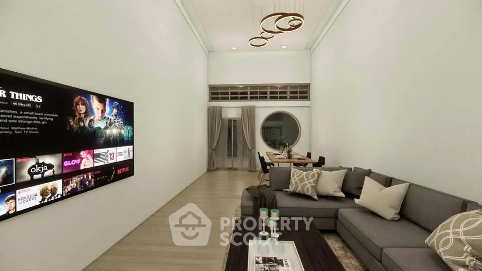 Modern living room with sleek decor and entertainment system, perfect for relaxation and gatherings.