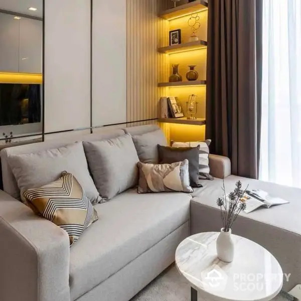 Chic modern living room with plush grey sofa, striking yellow shelving, elegant marble coffee table, and warm ambient lighting.