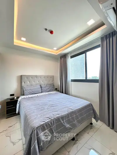 Modern bedroom with stylish ceiling lights and large window