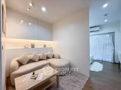 Modern living room with cozy sofa and stylish decor in a bright apartment