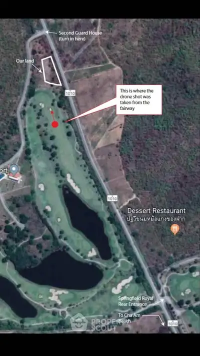 Aerial view of golf course with labeled landmarks and directions for real estate development.