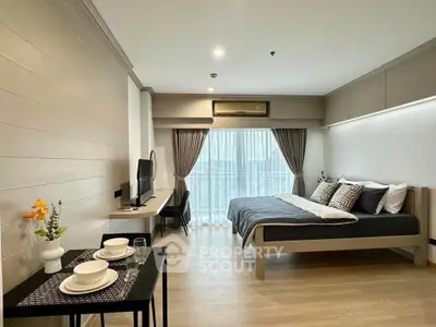 Modern studio apartment with stylish decor and natural light