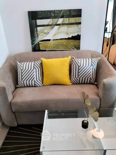 Stylish living room with modern sofa and decorative pillows