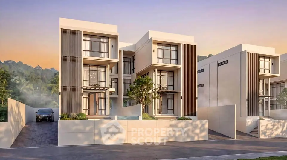 Modern luxury villas with sleek design and large windows at sunset, showcasing contemporary architecture.