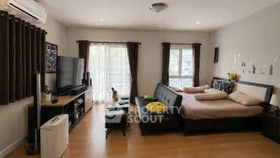 Cozy studio apartment with modern decor and natural light