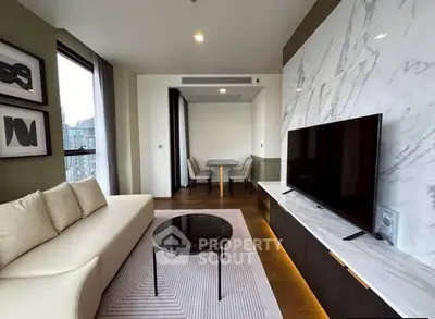 Luxurious modern living room with marble accent wall and sleek furniture