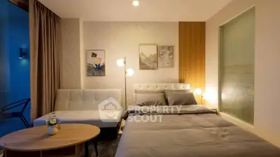 Modern bedroom with stylish decor and cozy lighting