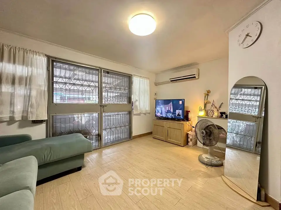 Cozy living room with modern decor and natural light