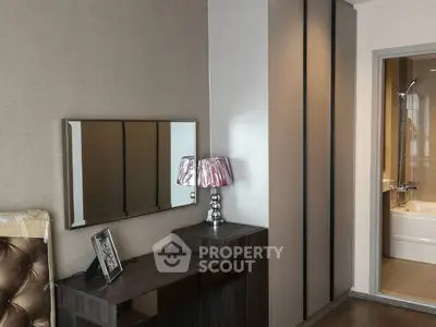 Modern bedroom with stylish decor and elegant lighting