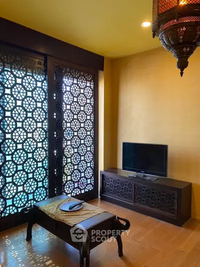Elegant living room with intricate lattice design and traditional decor