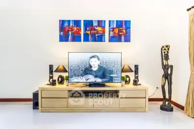 Modern living room with stylish decor and entertainment center
