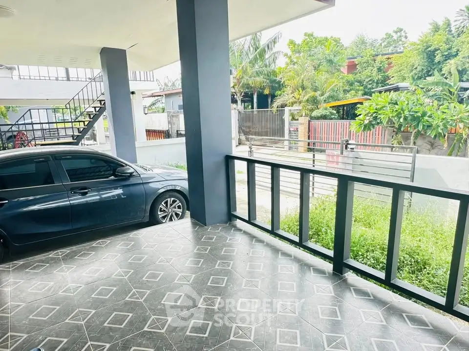 Spacious covered parking area with modern design and garden view