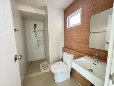 Modern bathroom with sleek fixtures and stylish tile design