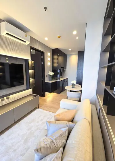 Modern living room with sleek design and cozy seating area