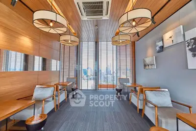 Modern study room with city view, wooden accents, and stylish lighting.