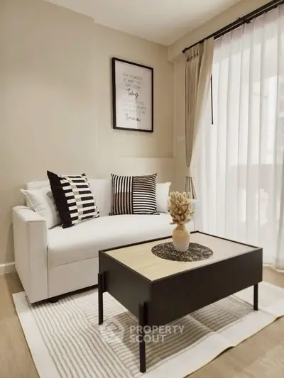 Stylish modern living room with cozy sofa and elegant decor