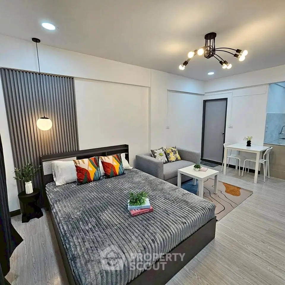 Modern studio apartment with stylish decor and cozy living area