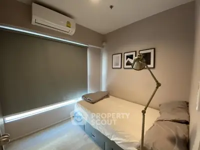 Cozy bedroom with modern decor and natural light