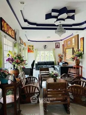Elegant living room with unique wooden furniture and vibrant decor