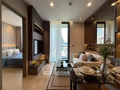 Modern apartment with stylish living room and bedroom, featuring city view and elegant decor.