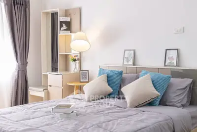 Cozy bedroom with stylish decor and natural light