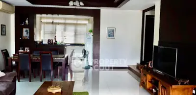 Spacious living room with dining area and modern decor