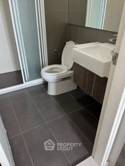Modern bathroom with sleek design and glass shower enclosure