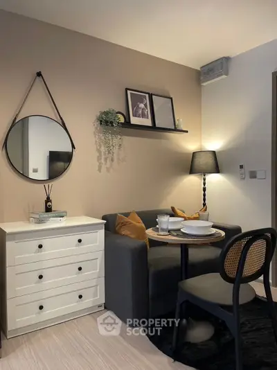 Cozy living room with modern decor and dining setup