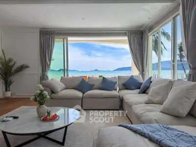 Luxurious living room with stunning ocean view and elegant decor