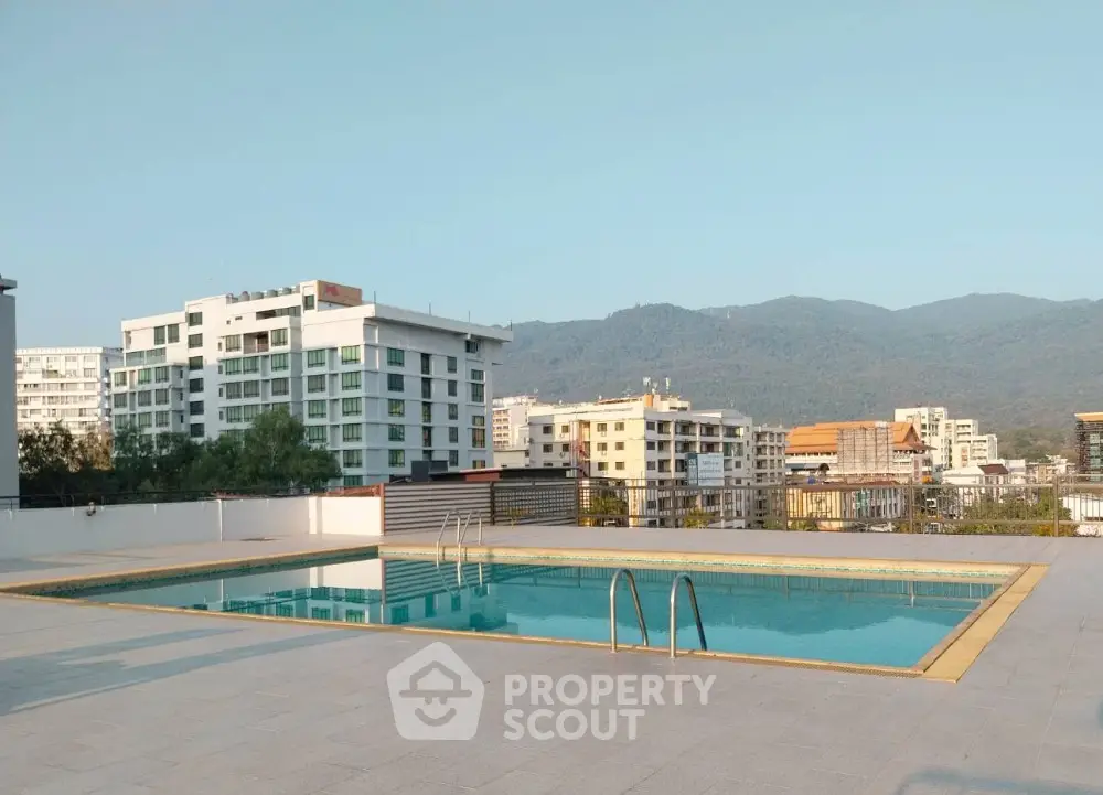 Stunning rooftop pool with panoramic city and mountain views