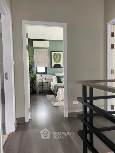 Modern bedroom with stylish decor and sleek flooring