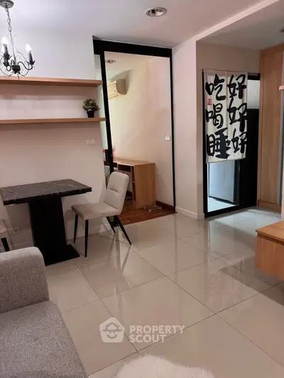 Modern living room with sleek furniture and open layout, perfect for urban living.