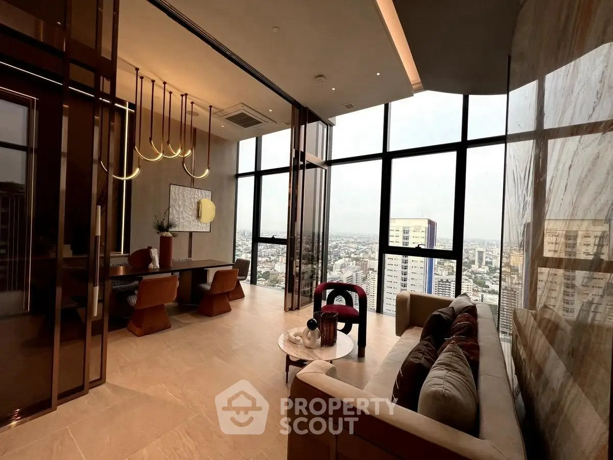 Luxurious high-rise living room with stunning city view and elegant decor.