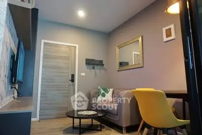 Cozy living room with modern decor and stylish furniture, perfect for relaxation and entertaining.