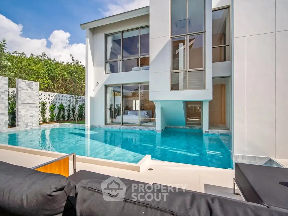 Luxurious modern home with stunning pool and sleek architectural design, perfect for upscale living.