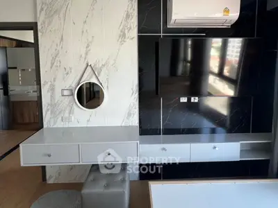 Modern living room with sleek TV setup and stylish decor