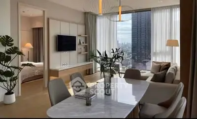 Luxurious modern living room with city view, elegant decor, and open layout in high-rise apartment.