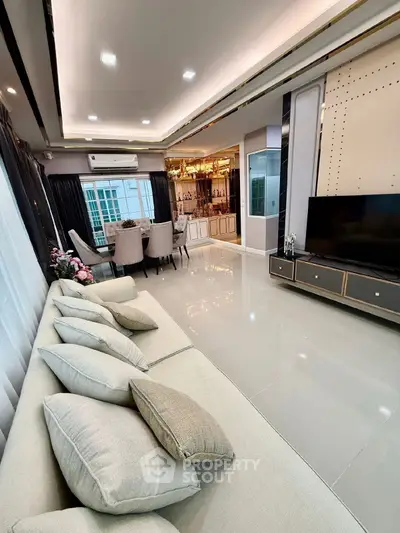 Luxurious modern living room with elegant dining area and stylish decor