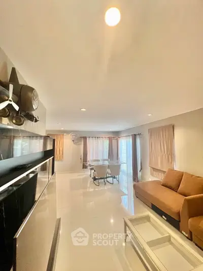 Spacious modern living room with elegant decor and natural light